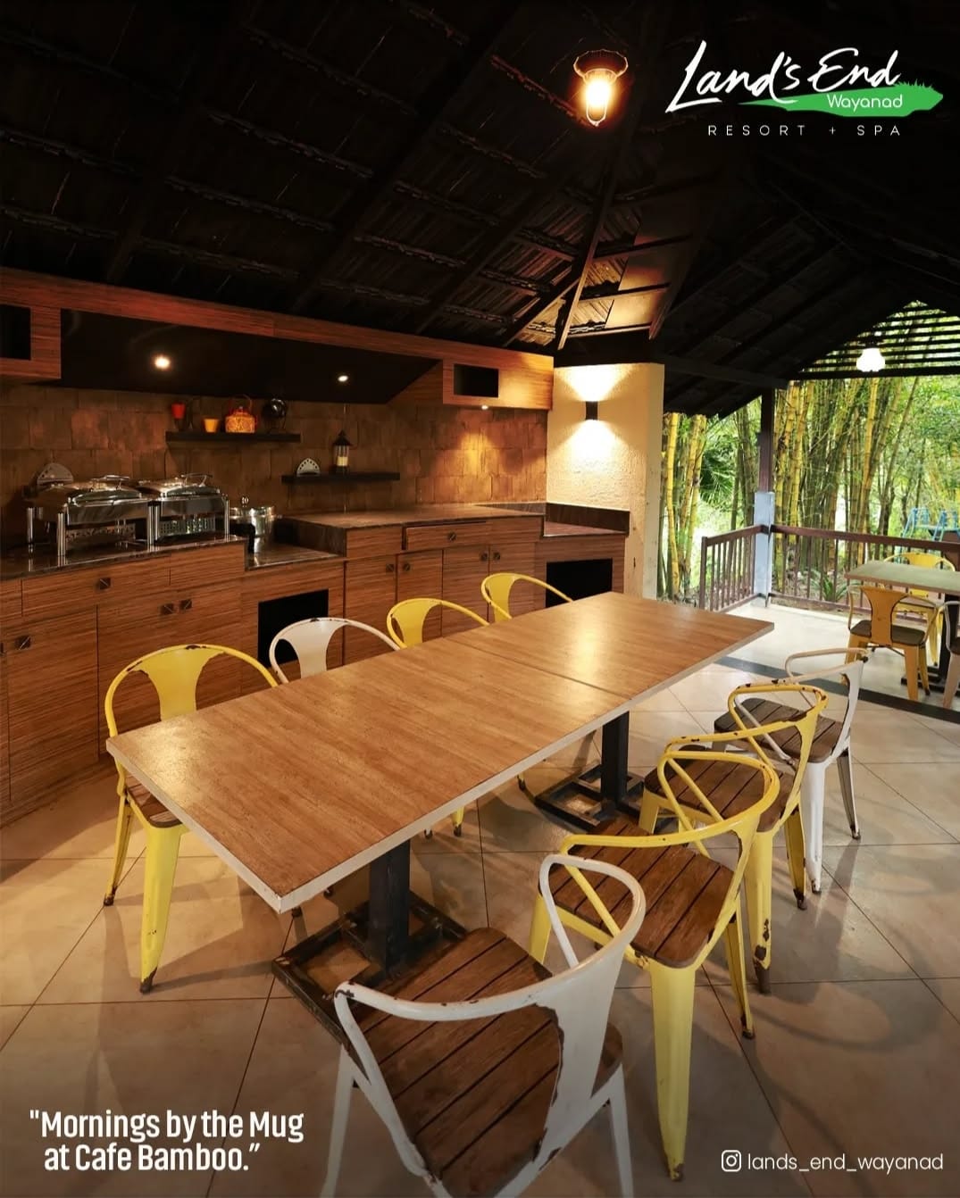 Open-air Café Bamboo with wooden tables at Land's End Resort