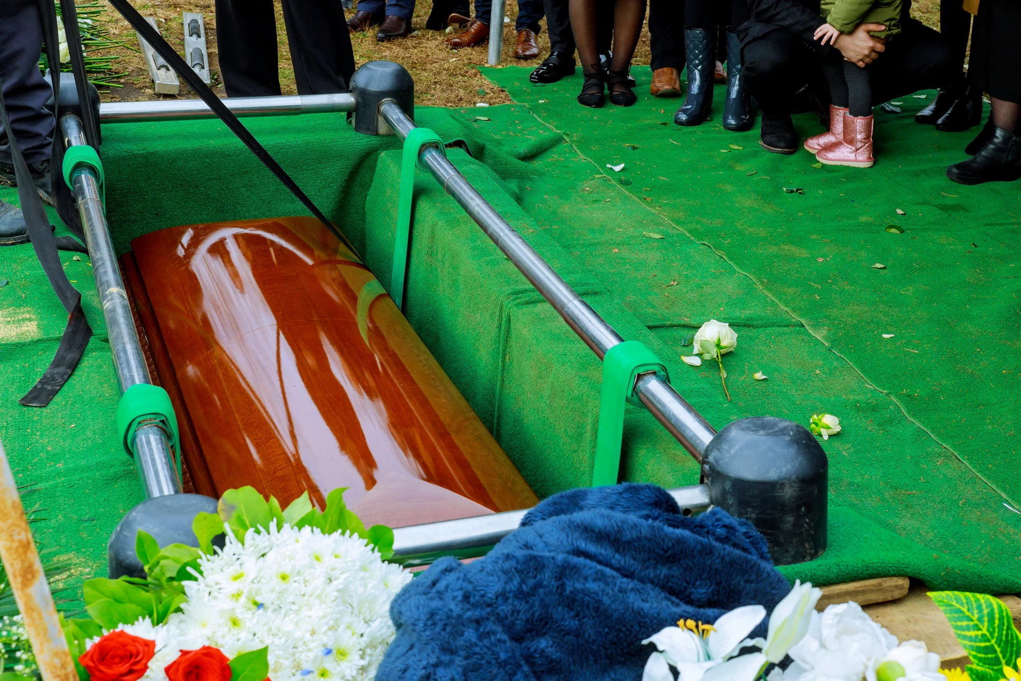 A family gathers at a graveside service